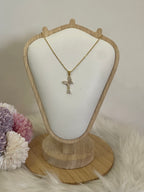 Collana Metamorfosi in Acciaio Dorato con Farfalla e Punto Luce