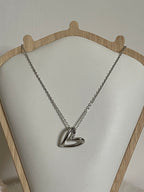 Collana Fluid Heart - Pendente a Cuore Stilizzato in Acciaio Inossidabile