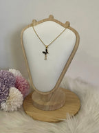 Collana Metamorfosi in Acciaio Dorato con Farfalla e Punto Luce