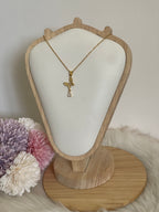 Collana Metamorfosi in Acciaio Dorato con Farfalla e Punto Luce