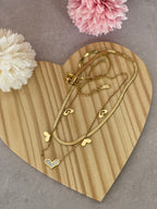 Collana Coralie Doppio Filo in Acciaio Gold con Cuori - Eleganza Romantica
