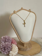 Collana Metamorfosi in Acciaio Dorato con Farfalla e Punto Luce