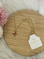 Collana Metamorfosi in Acciaio Dorato con Farfalla e Punto Luce
