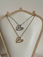 Collana Fluid Heart - Pendente a Cuore Stilizzato in Acciaio Inossidabile