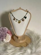 Collana Aura Summer Charm Estiva in Acciaio Inossidabile - Girocollo Cordino Intrecciato Verde con Ciondoli Sole, Cuore e Fiore