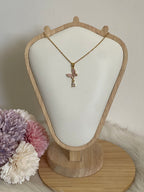 Collana Metamorfosi in Acciaio Dorato con Farfalla e Punto Luce
