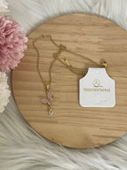 Collana Metamorfosi in Acciaio Dorato con Farfalla e Punto Luce