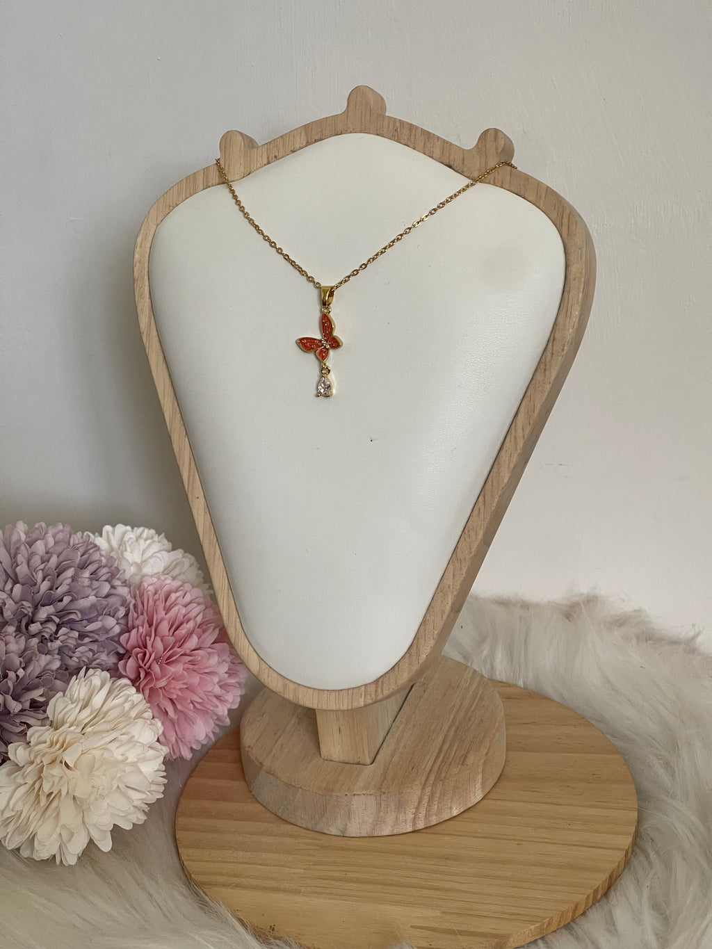 Collana Metamorfosi in Acciaio Dorato con Farfalla e Punto Luce