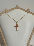 Collana Metamorfosi in Acciaio Dorato con Farfalla e Punto Luce