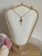 Collana Metamorfosi in Acciaio Dorato con Farfalla e Punto Luce