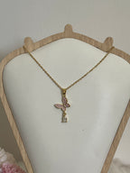 Collana Metamorfosi in Acciaio Dorato con Farfalla e Punto Luce