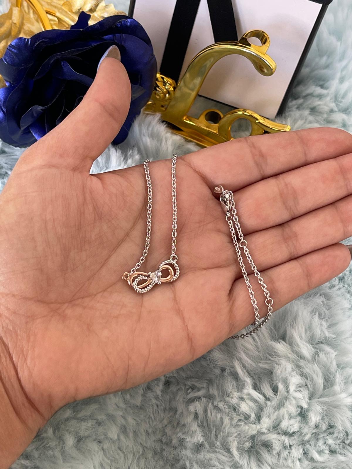 Collana Eleganza con Simbolo dell'Infinito in Argento 925 e Dettagli Rosé